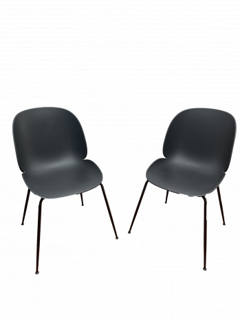A pair of Beetle Dining Chairs